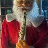 0ea71b03-7d2a-49f9-bea0-113ae8eb9fe6 6-Feet Musical Saxophone Santa