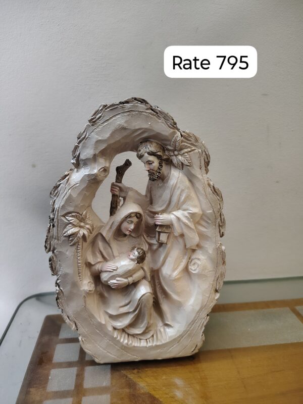 Holy family wooden crave