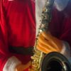 6944f499-513f-4b66-9a05-5306ca89c1e6 6-Feet Musical Saxophone Santa
