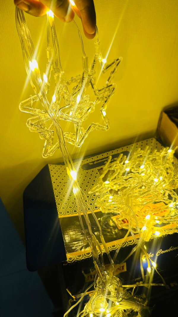 WhatsApp Image 2025-11-17 at 23.12.52_0a09c303 LED Acrylic Star & Reindeer Hanging Light – Warm White