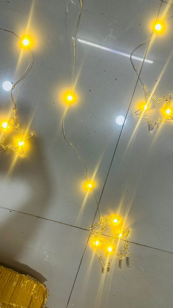 WhatsApp Image 2025-11-17 at 23.12.52_59f34bee LED Acrylic Star & Reindeer Hanging Light – Warm White