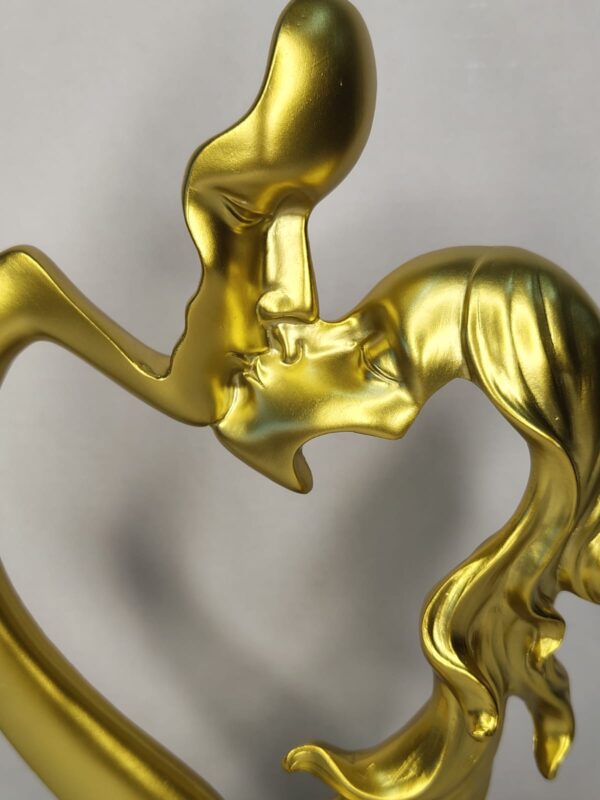 WhatsApp Image 2026-03-04 at 1.03.28 PM Romantic Couple Heart Sculpture Gold – Modern Love Art Showpiece