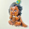 WhatsApp Image 2026-07-17 at 9.36.14 AM (1) baby krishna wall hanging