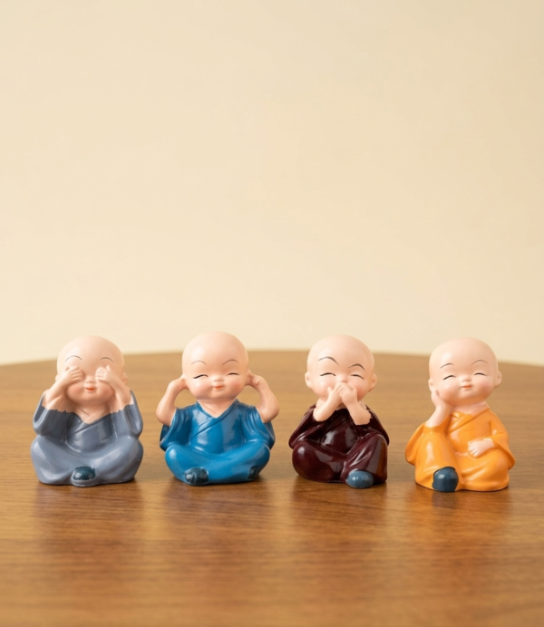 Four Wise Monks Decorative Figurine Set – Colorful Meditation Monk Statues for Home & Office Décor